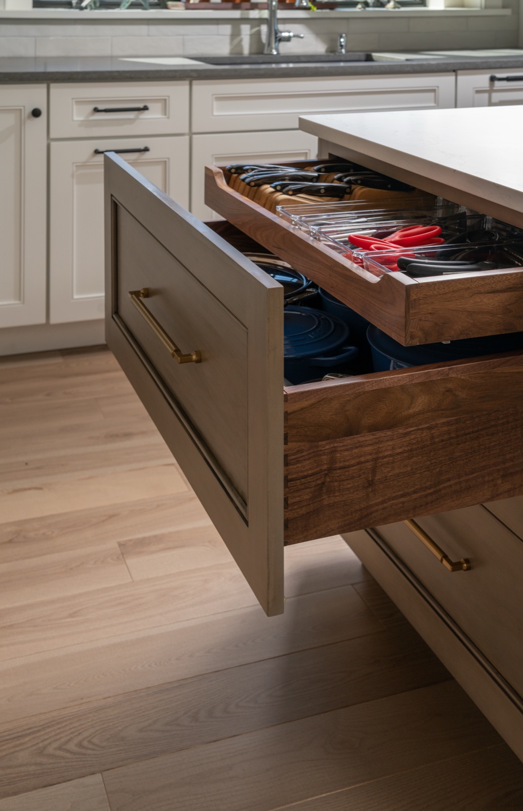 Kitchen island drawer fitted with wood dividers to organize utensils, by Refinery ATX in Austin, TX